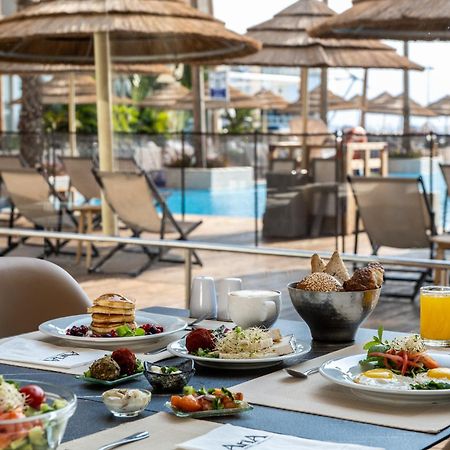 Aria Eilat Exterior foto A buffet at a hotel